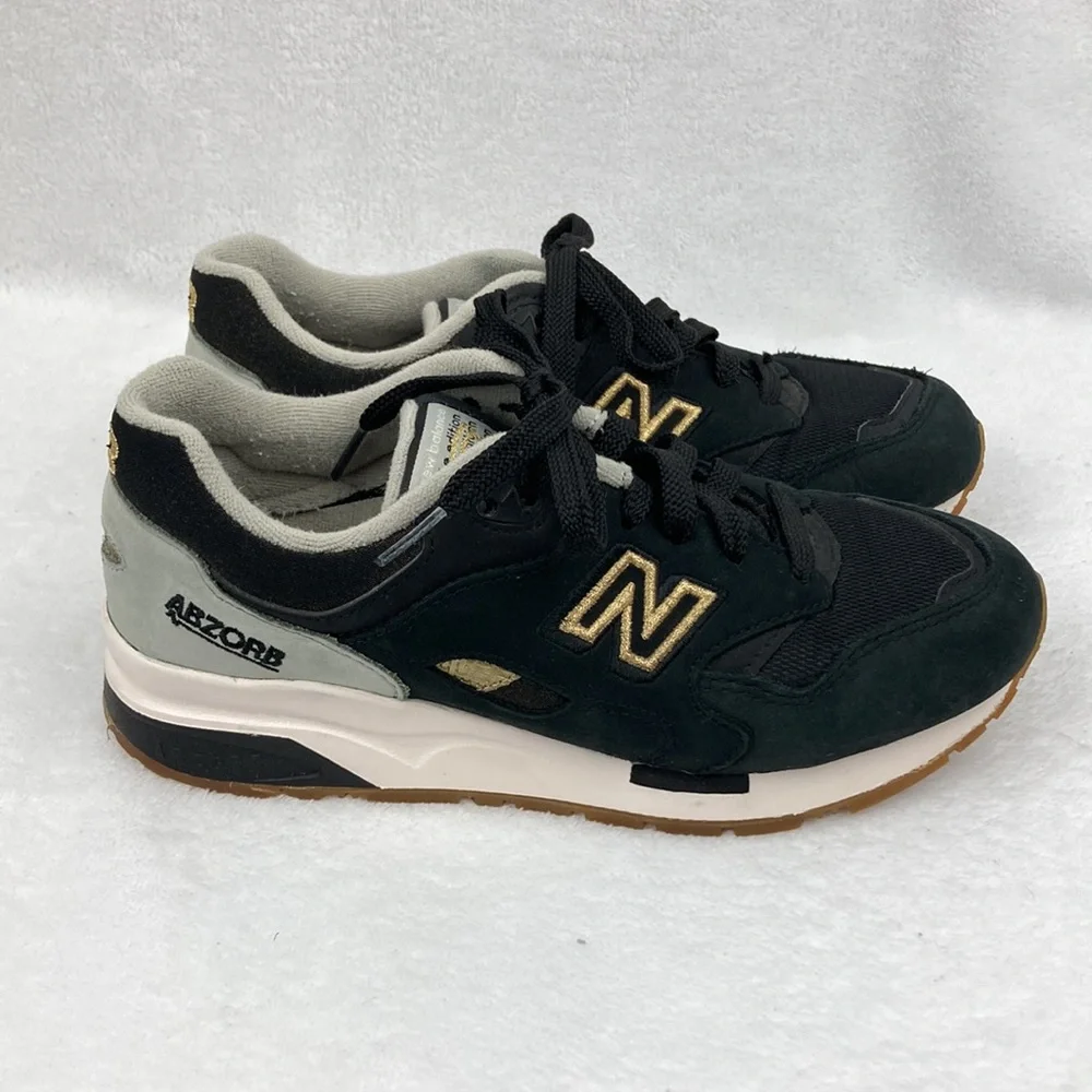 New Balance Women’s Abzorb Black and Gold Sneakers sz 6.5